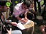 Another Signature Collecting in Martz Village (Photo)